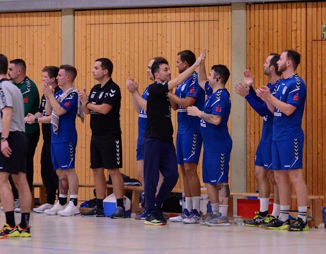 Zufriedener Trainer, Christian Job (Mitte)