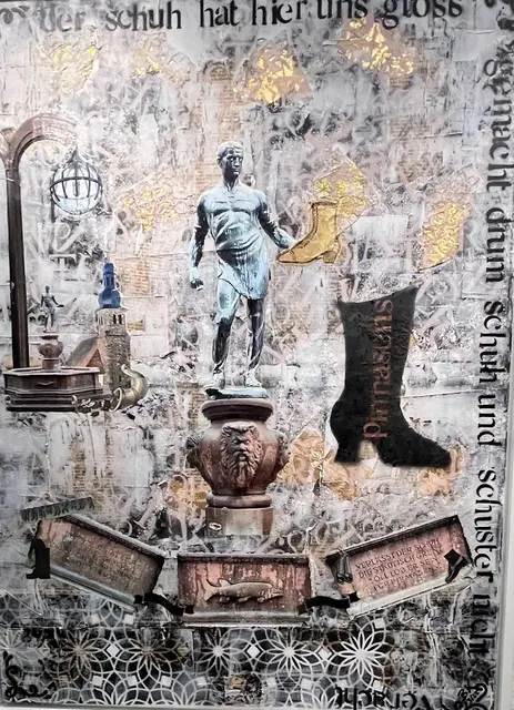 Ein großformatiges Werk mit der Statue des „Schuhmachers“ im Zentrum, umgeben von Ornamenten, Lampen, Schuhmotiven und goldfarbenen Akzenten. Es verweist auf die stolze Vergangenheit der Schuhmetropole und ihre kulturellen Symbole.Ein farbenfrohes Werk, das Pirmasens in seiner Geschichte und Gegenwart als Schuhstadt zeigt: Im Zentrum ein Reißverschluss, der eine Hand freilegt – Symbol für Öffnung und Bewegung. Umgeben von bunten Schuhen, Beinen und Farbspritzern, verbindet da... Mehr anzeigen | Foto: Z. Haggag