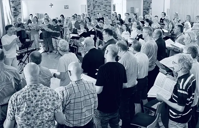 Gemeinsame Probe der drei Chöre in Worms (hier mit Dirigent Julian Müller) | Foto: Enjott Schneider