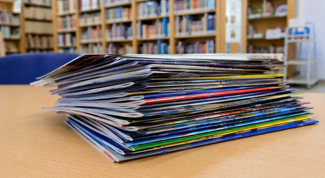 Kostenlose Comic-Hefte zum Mitnehmen. Wer früh da ist, hat die größte Auswahl. (Symbolbild) | Foto: Mit KI erstellt/Eva Bender