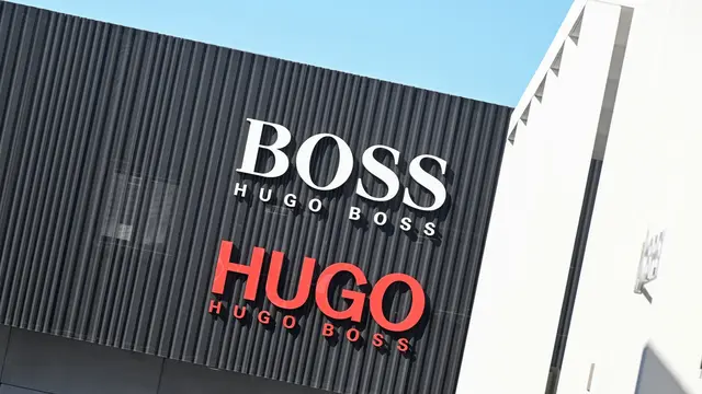 Hugo Boss: Umsatz- und Ergebnisrückgang im zweiten Quartal. (Symbolbild) | Foto: Bernd Weißbrod/dpa