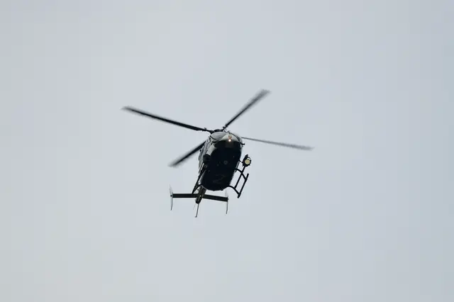Die Polizei sucht mit einem Hubschrauber nach der vermissten Seniorin aus Mannheim. | Foto: CarloEmanuele/stock.adobe.com