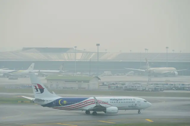 Luftverschmutzung belastet Malaysia: Smogähnlicher Haze tritt derzeit sowohl auf der Halbinsel als auch auf Borneo auf. | Foto: Vincent Thian/AP/dpa