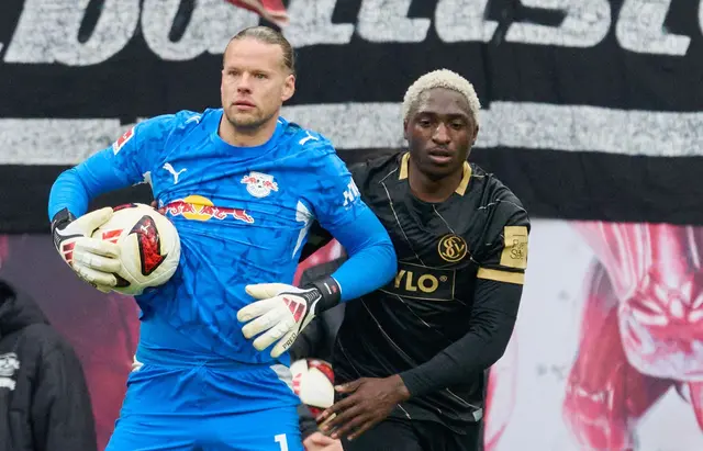 Zwei der auffälligsten Aklteure der ersten Halbzeit: Torwart Orjan Nyland (RB Leipzig, links) und David Mokwa (SV 07 Elversberg) | Foto: Hendrik Schmidt/dpa